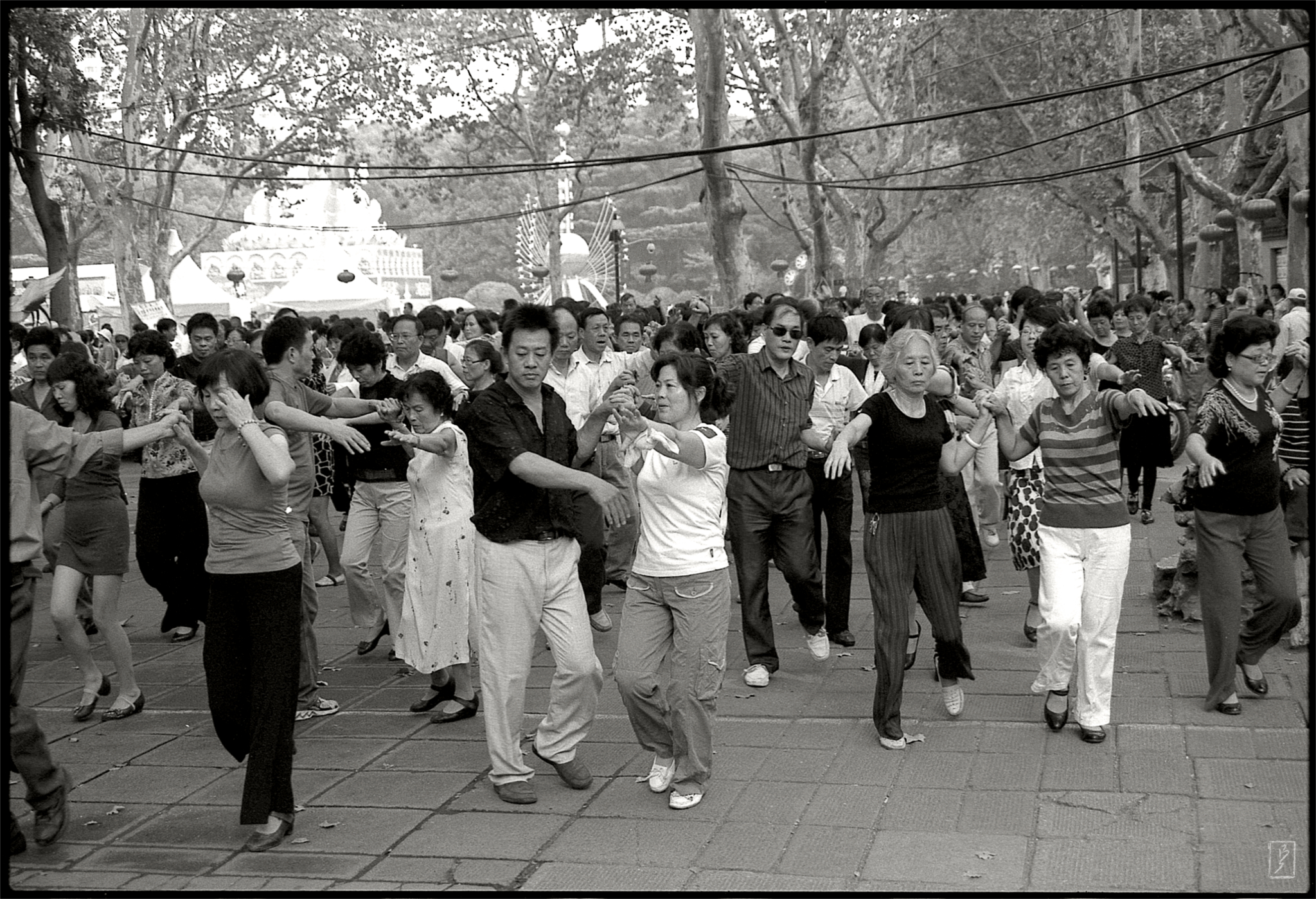 Lu Xun park (鲁迅公园): Public dance group.