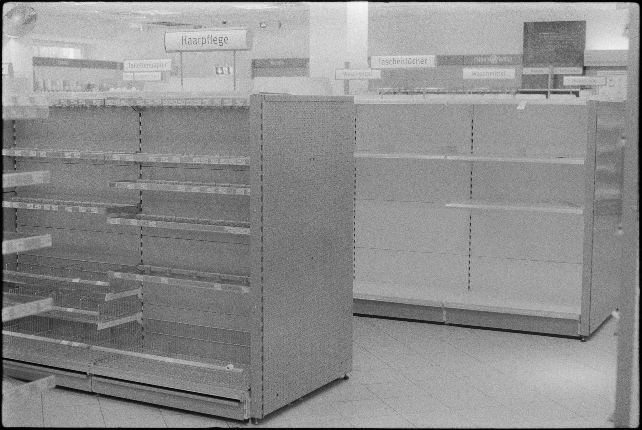 Empty shelves during a fire sale in the drugstore on Wandsbeker Marktstraße. (1)